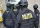 Percheziţii la Craiova. Pistol deţinut ilegal de un tânăr